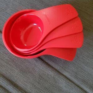 Tupperware  Four Measuring Red Cups
